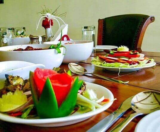 The Farm Kitchen at Manas Resort serving authentic Indian and global cuisine