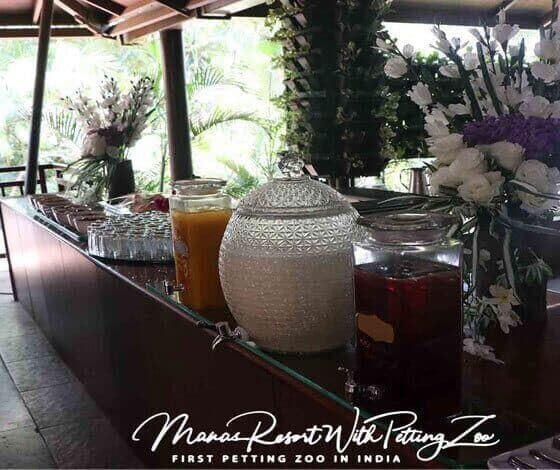 Variety of dishes laid out on a dining table at Manas Resort restaurant